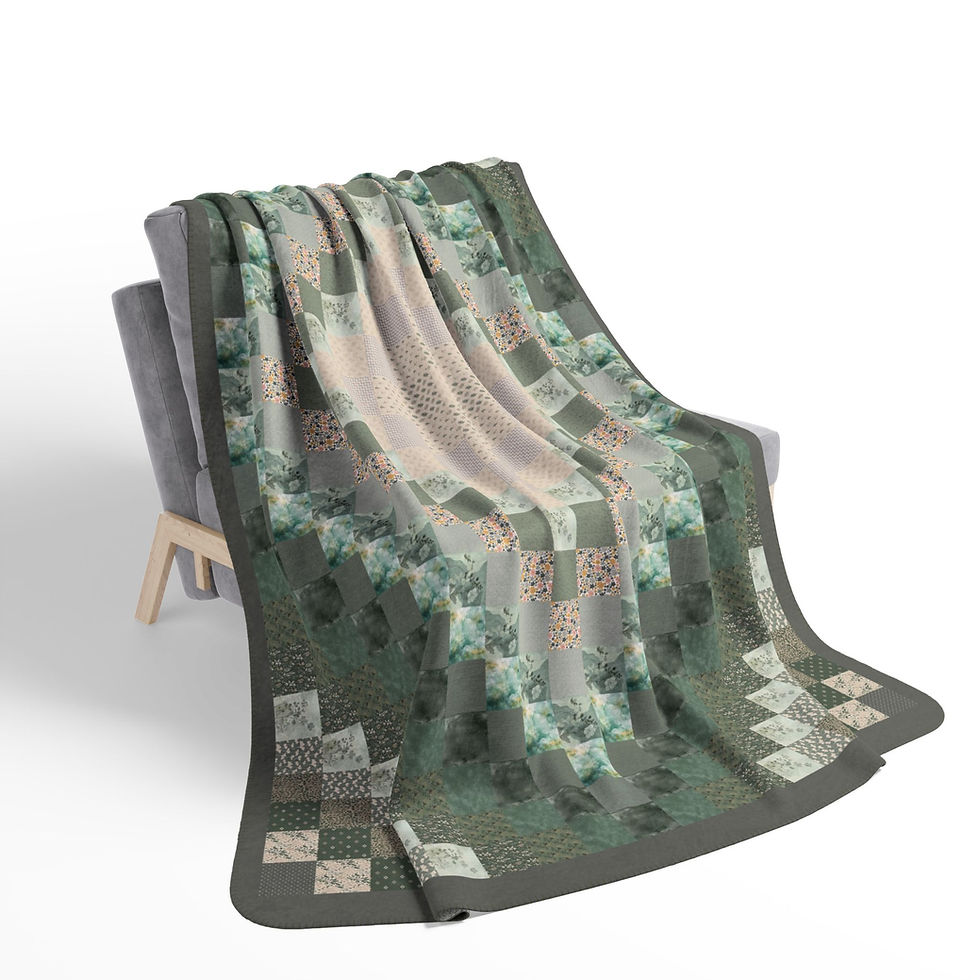 Thumbnail: Green and beige patterned throw blanket draped over a gray chair