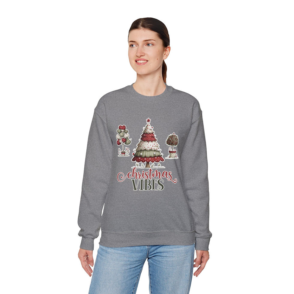 Thumbnail: Woman wearing gray sweatshirt with Christmas tree and festive vibes design.