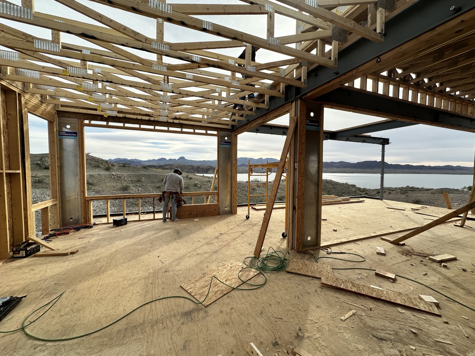 Wood trusses and steel beams working together