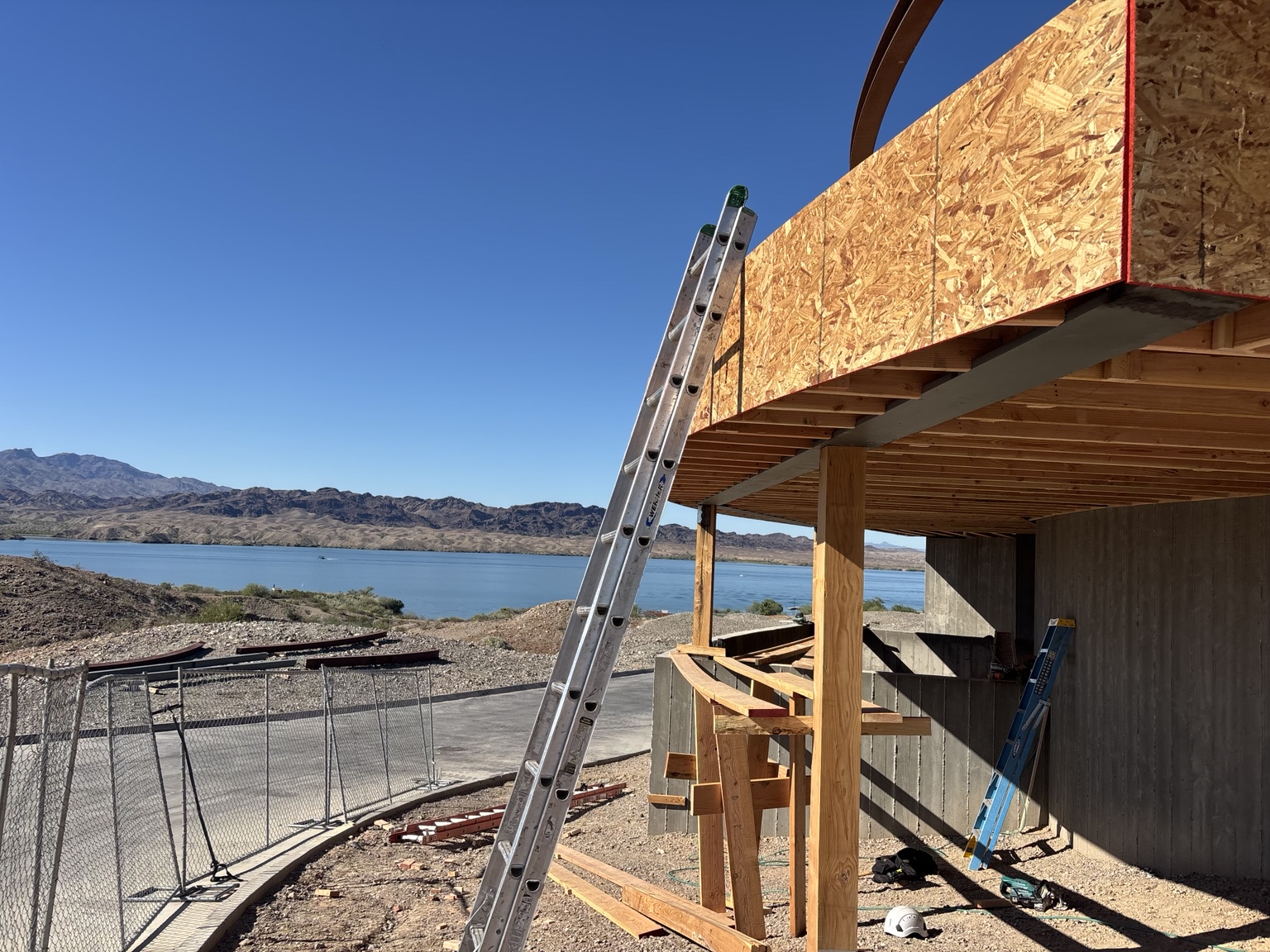 Cantilevered framing beside the lake