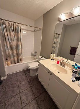 Organized, spotless bathroom after professional cleaning — results by Cleanphoria.