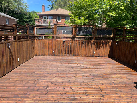 This deck & fence was stained to protect it from the elements to to keep it looking fresh - Beaches, Toronto