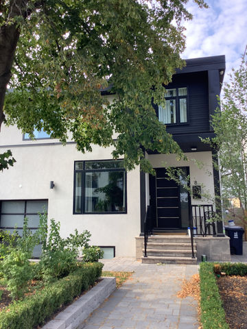 The Beaches, Toronto - Exterior painting of previously stained wood siding