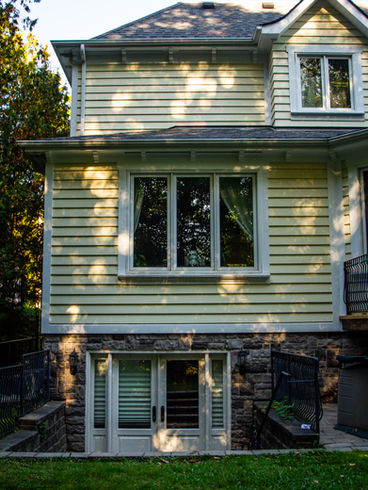 We restored the wood siding on this beautiful home in Toronto using a solid-stain