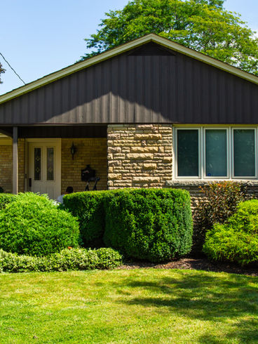 We stained the wood siding on this home