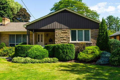 Port Credit, Mississauga - The exterior siding of this Port Credit home was sanded down and re-stained with a solid stain.