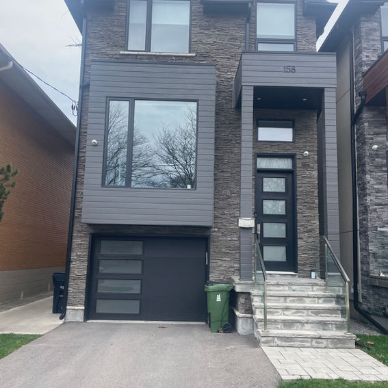 Exterior painting of wooden siding.