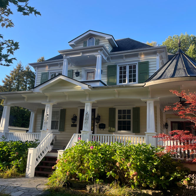 We repainted and re=stained the trim & siding on this beautiful home
