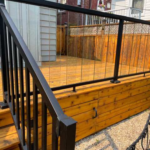 Staining a cedar deck with an oil-based semi-transparent stain - Downtown, Toronto