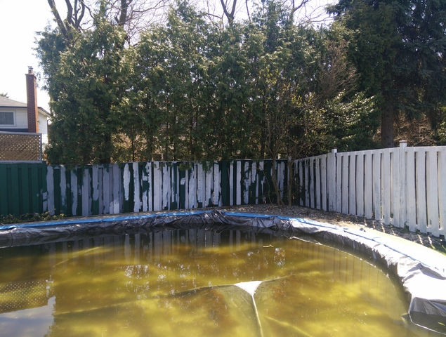 Spot priming the fence prior to painting. This is only required if you are painting the fence
