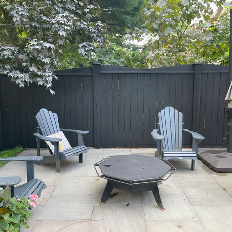 Solid stained fence in Tricorn Black by Sherwin Williams