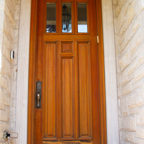 The door is sanded down to remove the existing coating