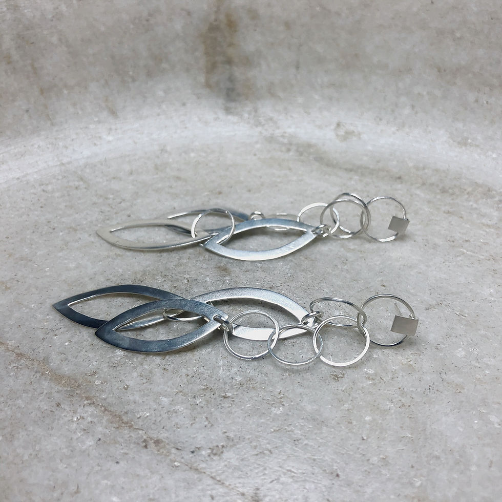 Thumbnail: Hanging shapes silver post earrings