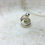Thumbnail: Double peridot swirl silver ring