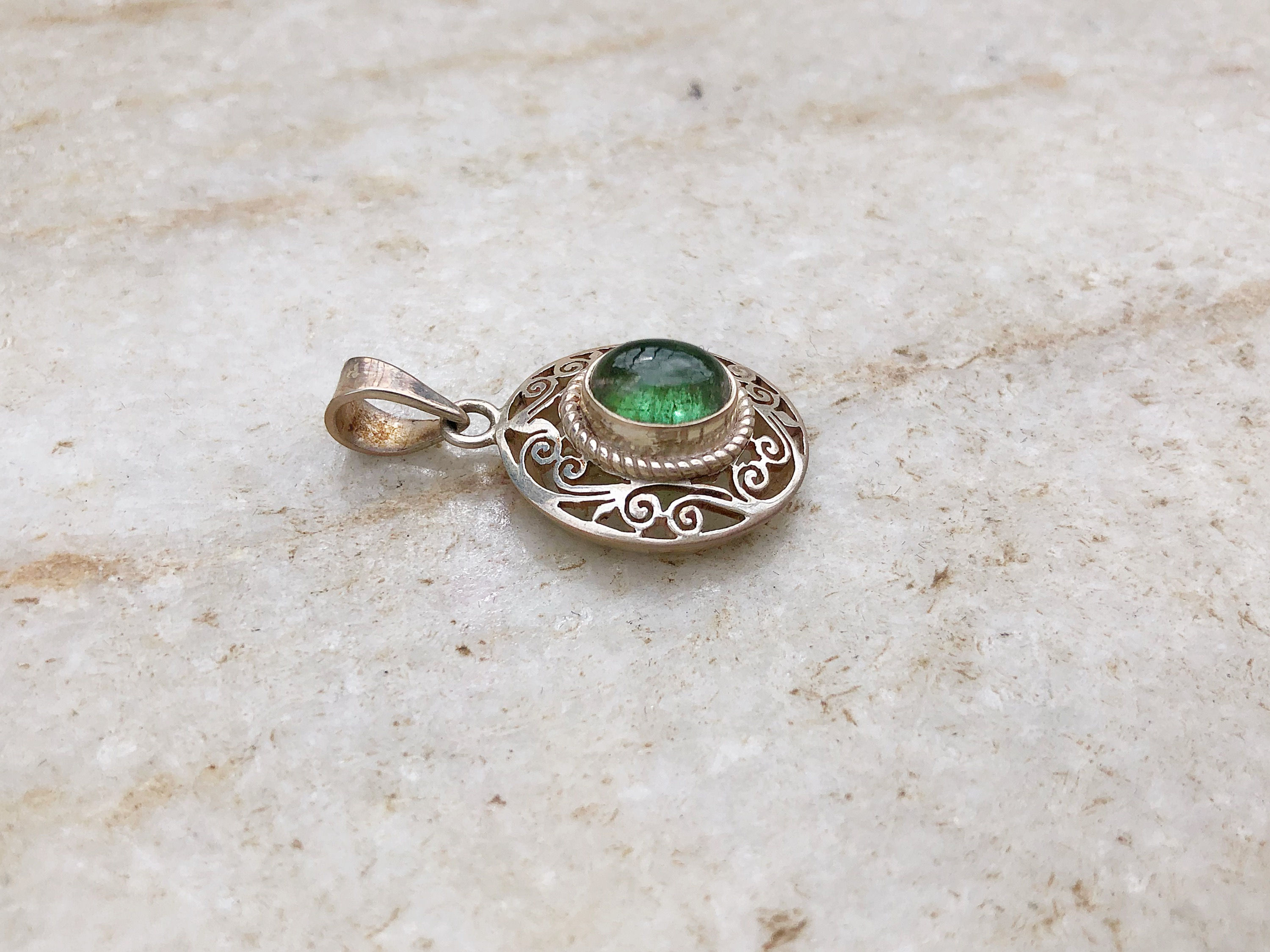 Aquamarine with jali work silver pendant