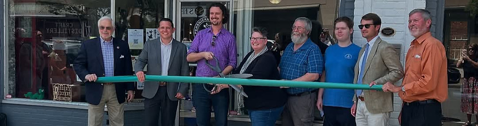 Ian cutting the ribbon as his local independent bookstore