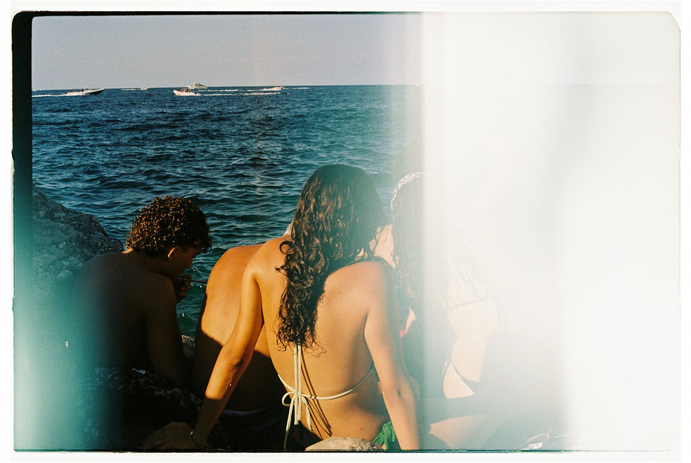 On film, by me. To be honest, I am really disappointed with the light leak on this one because you really cannot see much. All you can do is take my word. It felt like a movie. An Italian summer movie.