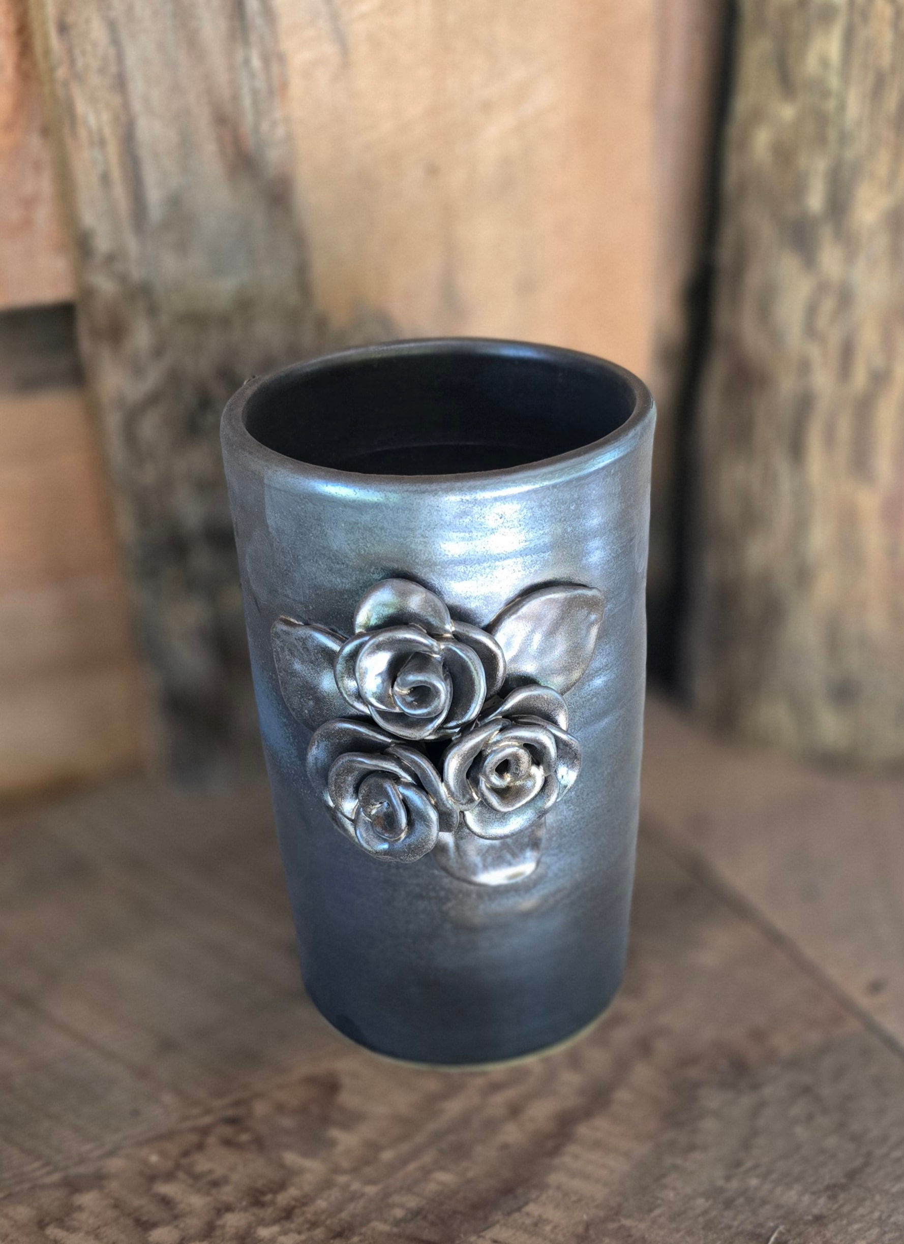 This photo shows one of our custom ceramic vases in the color of saturated gold