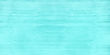 Old shabby turquoise painted wooden surface. Light teal pastel color wood texture. Rustic