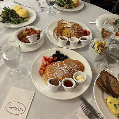 Cienna So creating UGC for Sarabeth’s restaurant near Central Park NYC