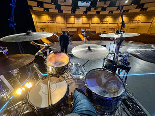 Drum kit overlooking a church worship auditorium