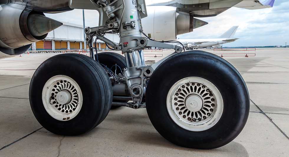 close-up-airplane-wheel-parked-airport.jpg