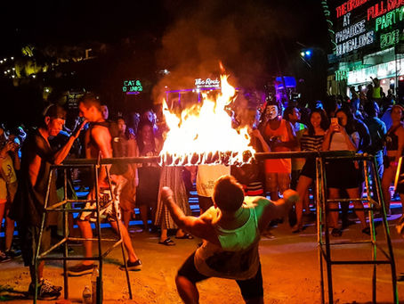 Crowd dancing at the 2026 Full Moon Party on Haad Rin Beach, Koh Phangan, Thailand