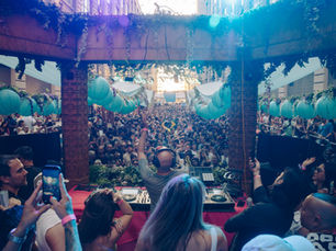 DJ booth overlooking the All Day I Dream crowd at Industry City in Brooklyn, New York.