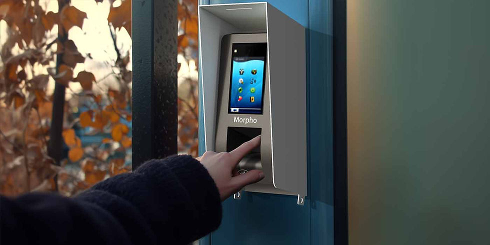 A hand with a finger touching a biometric reader with a Parabit housing on the reader, attached to a wall with fall leaves behind it 