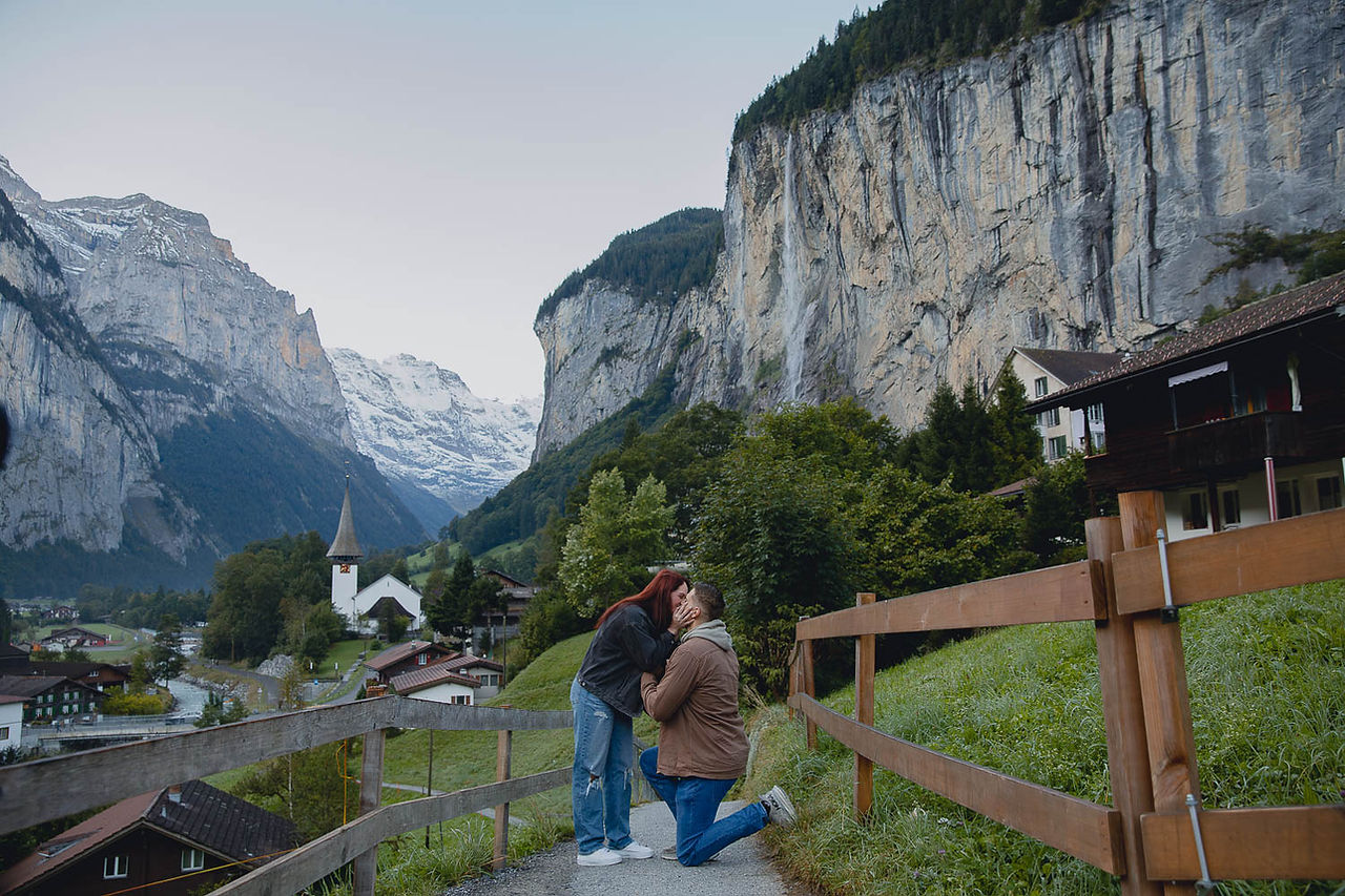 Engagement photoshoot in Lauterbrunnen with Swiss waterfalls and stunning mountain scenery.