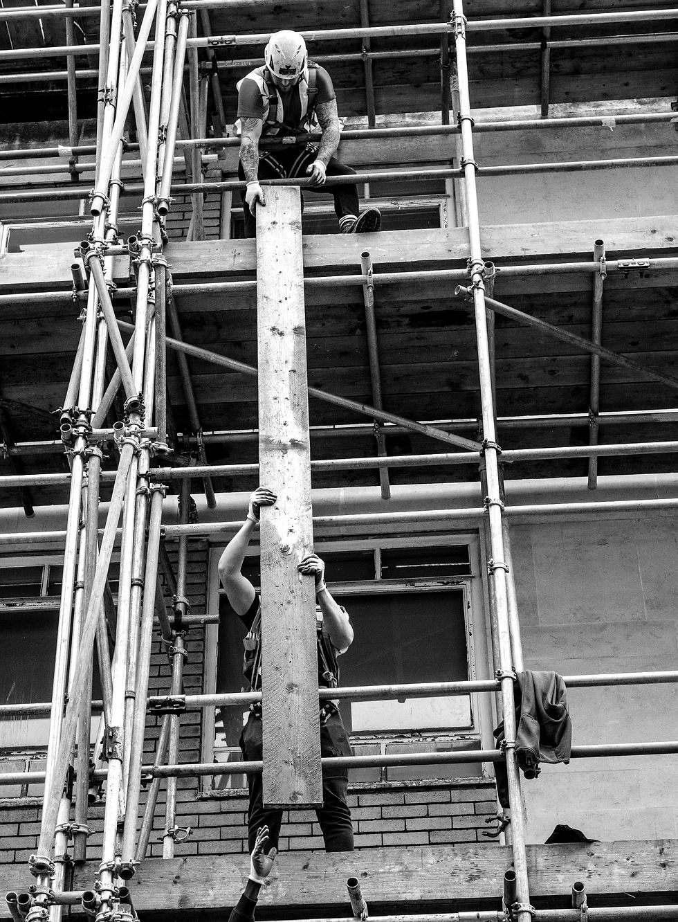 Construction workers on scaffolding