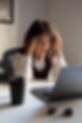 side-view-frustrated-woman-desk.jpg
