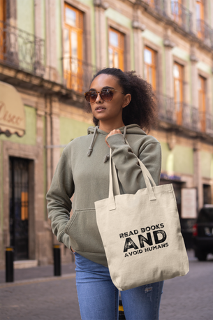 tote-bag-mockup-featuring-a-trendy-woman-walking-by-an-old-building-28871.png