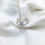 Thumbnail: Criss cross layered moissanite  ring