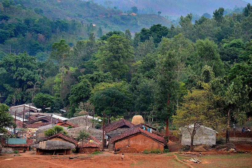 A village surrounded by forests.