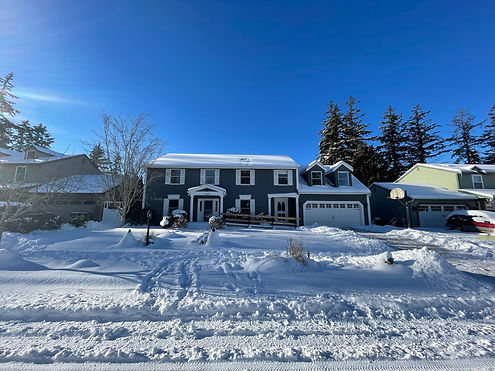 A photo of the PAD house in the winter with snow on the ground.