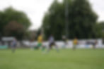 Opening goalscorer Scott Bakkor puts the pressure on Colls on league debut for Linnets. Picture by KELLY JONES.