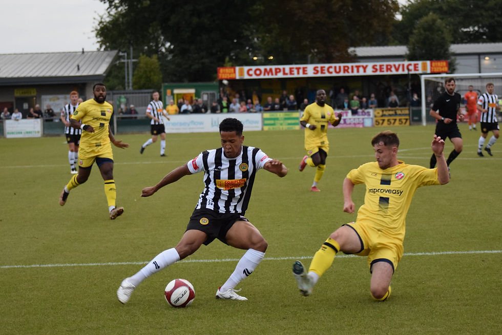 Joe Ferguson puts Trafford under the cosh. Picture by NEIL THORNTON.