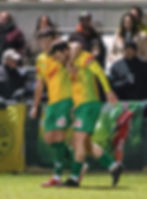 Celebrations for Linnets scorers James Steele, left, and Sean Miller. Picture by Ben Jackson.