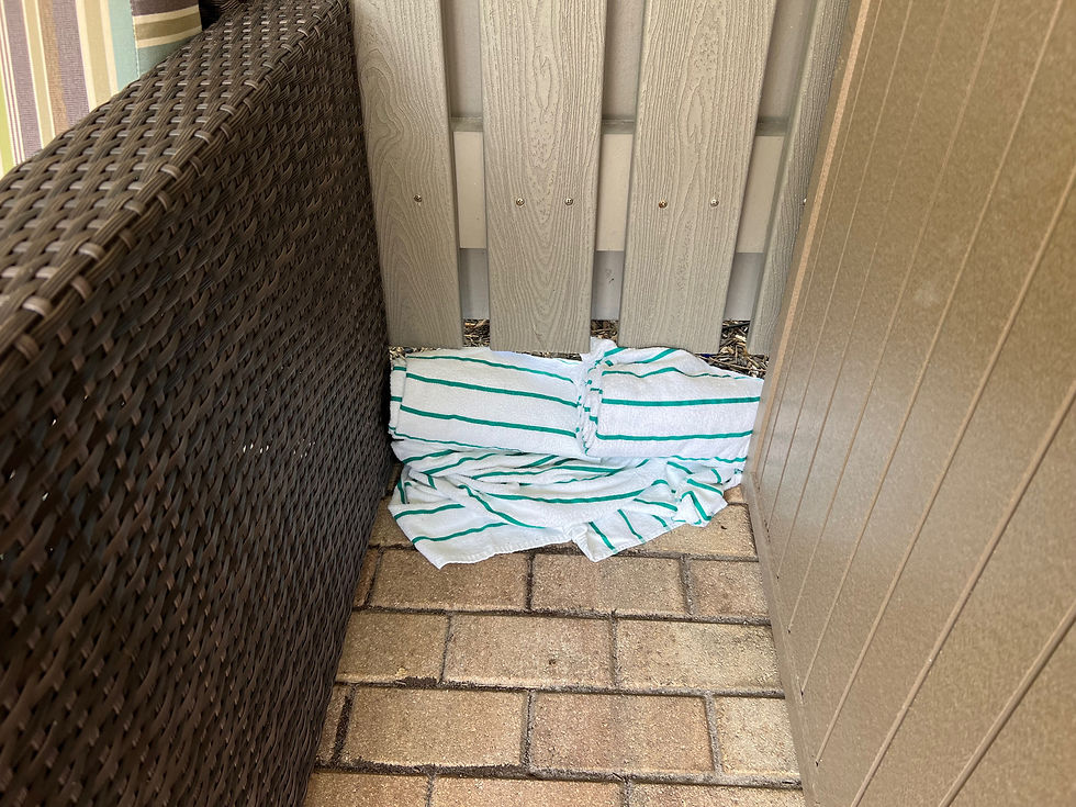 Pool towels plug a hole between wall and floor