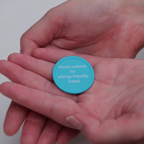 Teal token to exchange for allergy-friendly treats