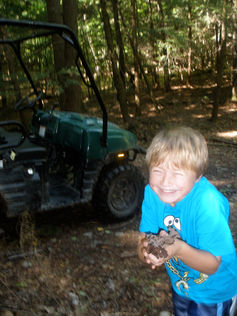 Mason smilling with joy in NH 2011.jpeg