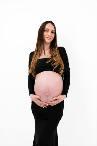 Maternity gown draped beautifully during Barnsley studio shoot