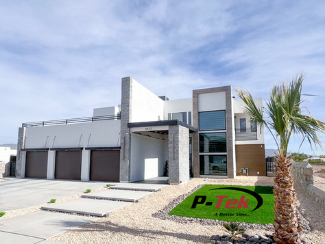 Modern house with large residential windows and triple garage