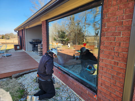 Window replacement in progress on brick home upgrading to vinyl windows – P-Tek