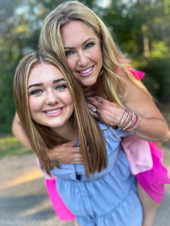 Smiling mother and daughter