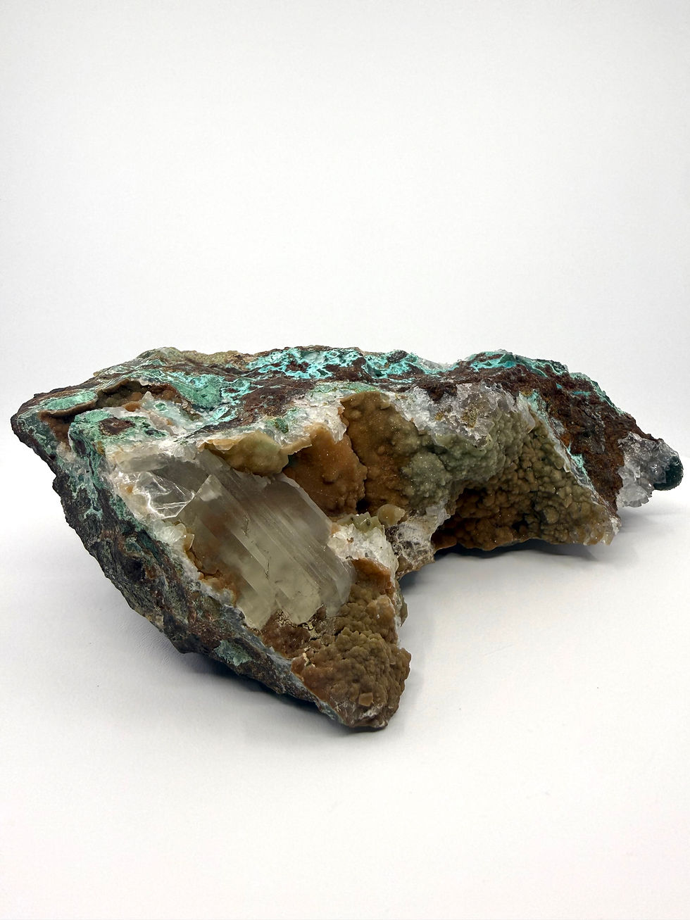 Thumbnail: Atacamite, Chrysocolla, Malachite, Selenite on Iron Oxide Matrix “Mineral Ship”