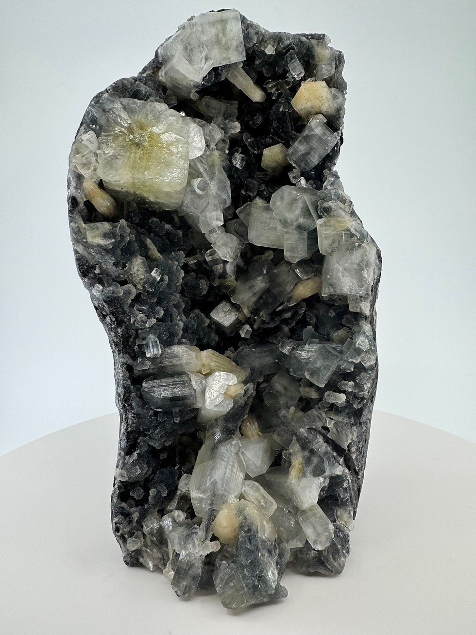 Thumbnail: Apophyllite, Stilbite on Black Chalcedony Geode