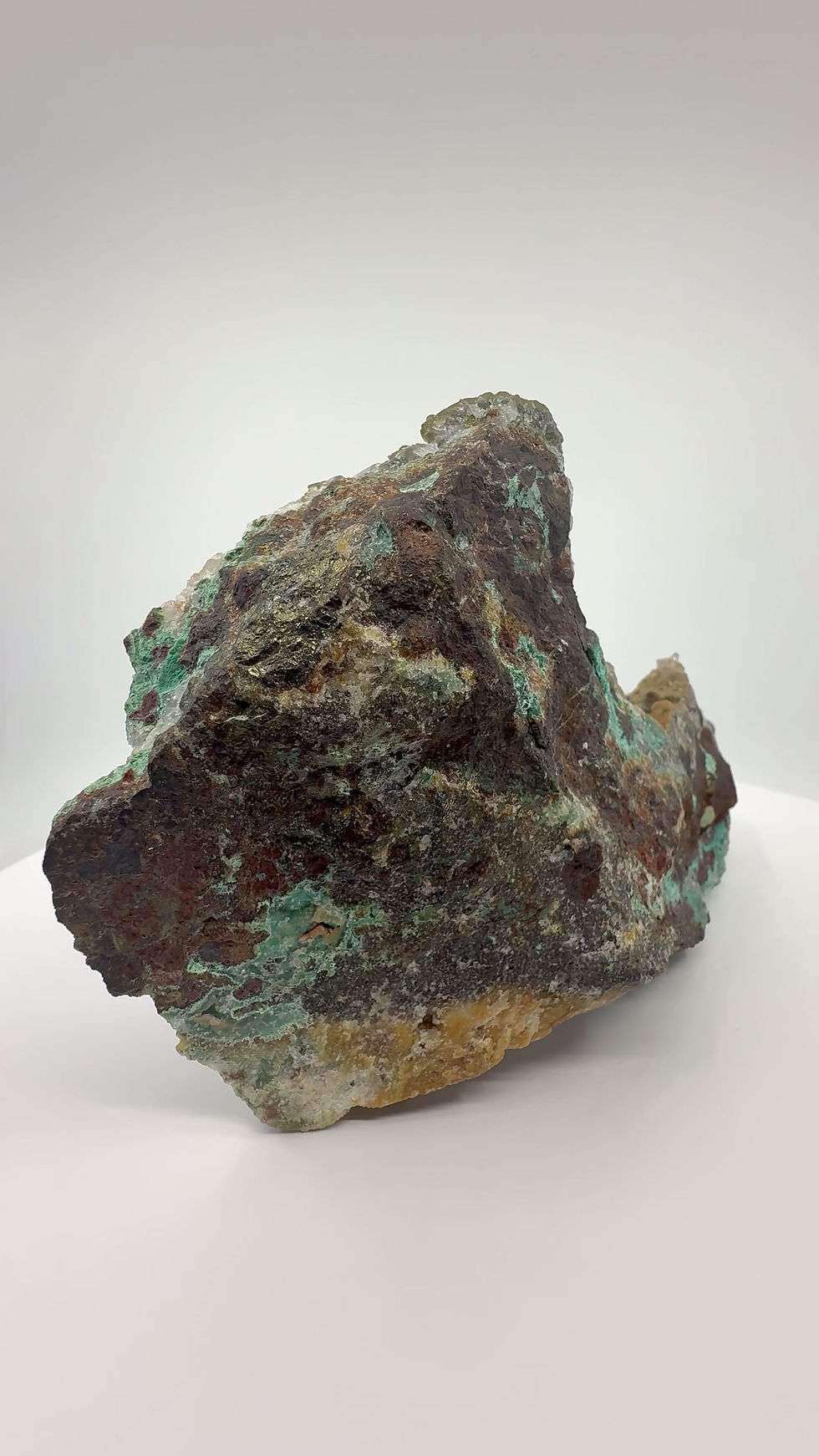 Thumbnail: Atacamite, Chrysocolla, Malachite, Selenite on Iron Oxide Matrix “Mineral Ship”