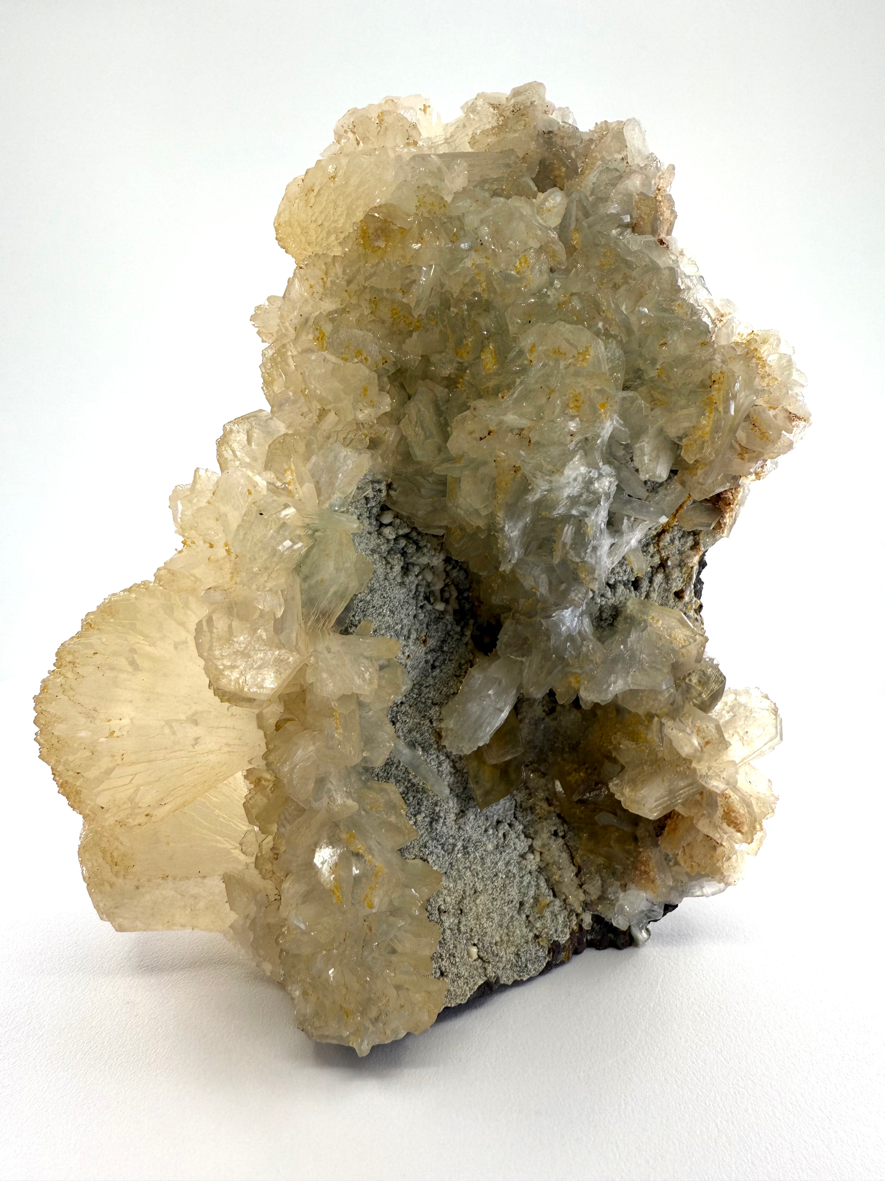 Glowing Stilbite with Calcite on Chalcedony